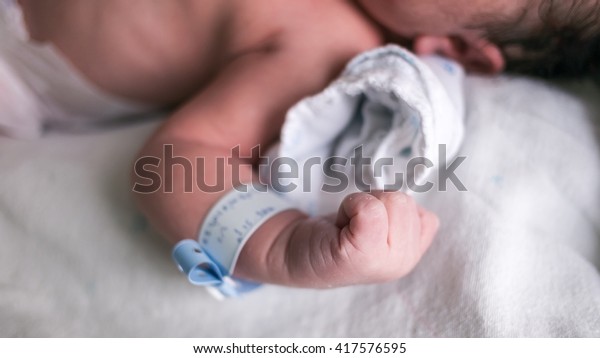 New born baby in\
hospital select focus