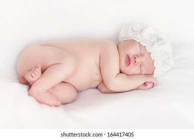 New Born Baby Portrait, Lying With Hat On Head, Sleeping