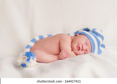 New Born Baby Portrait, Lying With Hat On Head, Sleeping