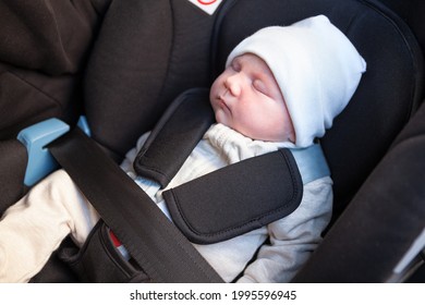 New Born Baby Sleeping Inside Of Car Safety Seat, Close Up View