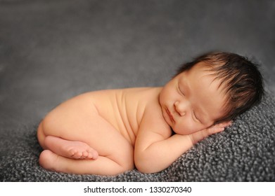 New Born Baby Sleeping On Blanket. Cute Little Child Close Up.