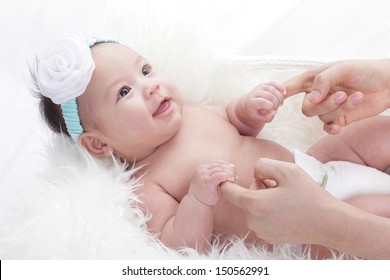 New Born Sleeping And Smiling Asian Baby With White Background