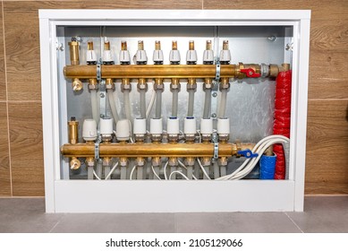 New brass manifold for underfloor heating systems with rotameters and thermoelectric actuators, serving nine circuits.