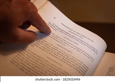 New Brunswick, NJ - September 20, 2020: Open Book Shows Selective Shallow Focus On Hand Pointing To The Second Amendment To The Constitution Of The United States, Known As The 