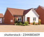 New build modern detached bungalow with block paved driveway. UK