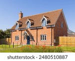 New build modern detached house with dormers. Suffolk. UK