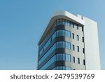 New building architecture on blue sky background,Low angle architectural exterior view of modern,copy space for text