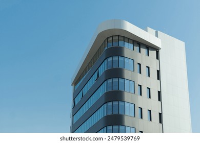 New building architecture on blue sky background,Low angle architectural exterior view of modern,copy space for text - Powered by Shutterstock