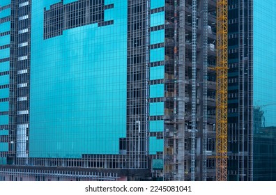 New Building being glass installation. construction environment - Shutterstock ID 2245081041