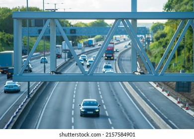 new built smart motorway traffic sign holder structure over moving traffic in england uk - Shutterstock ID 2157584901