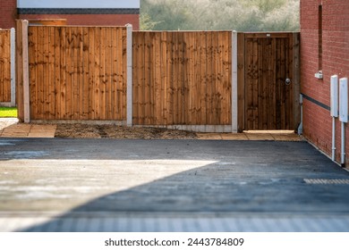 new built wooden boarded fence background in english town uk. - Powered by Shutterstock