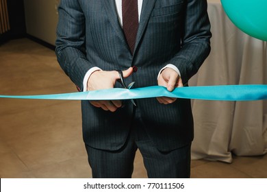 New Business Enterprise, Opening, Cutting A Blue Ribbon With Scissors Close-up.