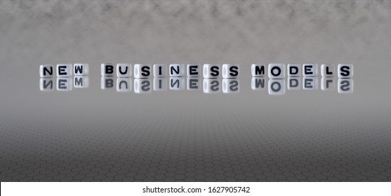 New Business Models Concept Represented By Wooden Letter Tiles