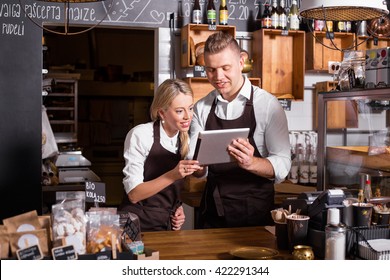 New business owners using tablet - Powered by Shutterstock