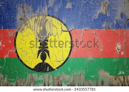 New Caledonia flag and paint cracks. Prison concept with border image. New Caledonia is currently heading toward recession. Inflation. employment. economic recession. Double exposure hologram