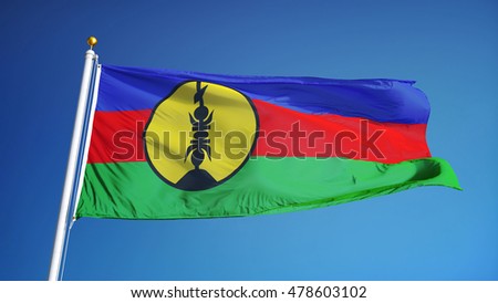 New Caledonia flag waving against clean blue sky close up, isolated with clipping path mask alpha channel transparency