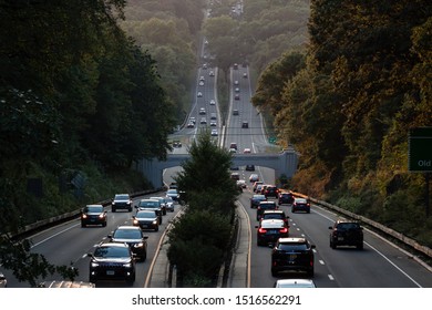 New Canaan, Ct, USA - 09/23/2019: Traffic At Dusk On The Merritt Parkway In Connecticut