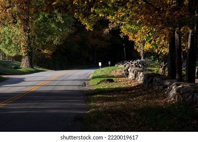 New Canaan, CT, USA - October 22, 2022: Rural Road During The Autumn Season In New Canaan Connecticut
