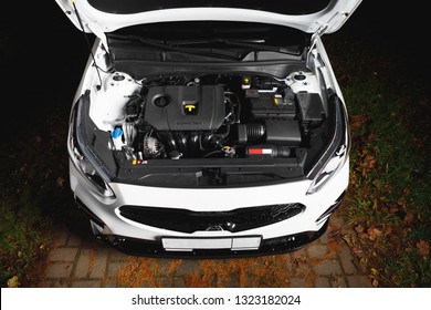 New Car Engine And Parts Under Hood Bonnet