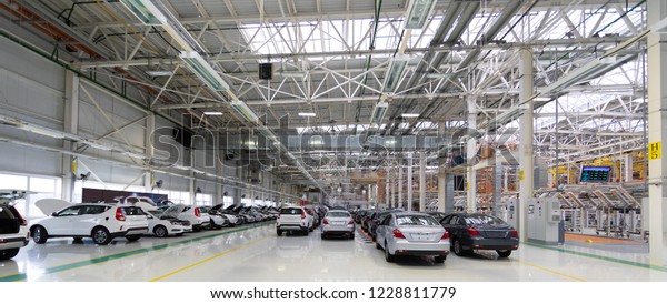 new car is at factory. Warehouse of cars. Modern\
car Assembly at factory