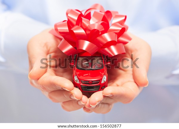 New car gift. Auto dealership and rental\
concept background.