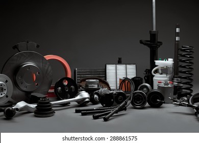 New car parts on a gray background closeup. Shop for auto