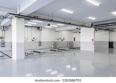 New car repair center. Empty car repair center. Interior of empty car dealership. - Shutterstock ID 2282888703