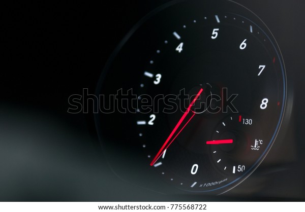 New car tachometer\
in the idle position.
