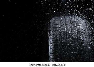 New Car Tire In Rain.