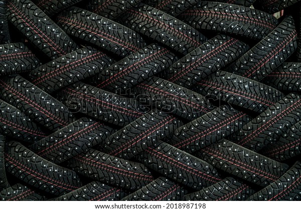 New car tires are stored in the\
store\'s warehouse with a braided pattern straight\
view