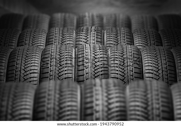 a lot of new car tires in the warehouse. store\
season tires.