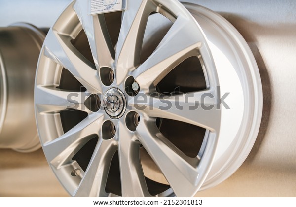 New car wheels for Toyota car. sale of\
components for cars in the official dealer showroom. Russia,\
Rostov-on-Don, 04.04.2022
