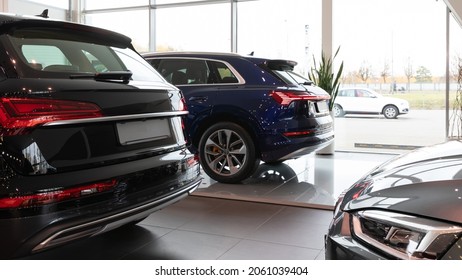new cars in the dealership, luxury SUVs
