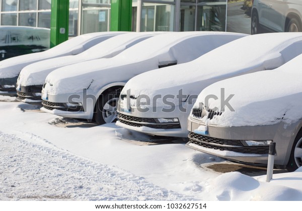 New cars\
in the motor show in the open air in\
winter