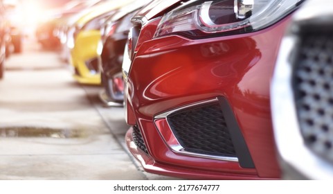 New Cars In Showroom For Sale. Cars Dealership Parking Lot. Automotive Industry.