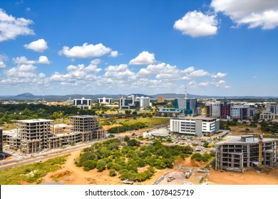 The New Central Business District In Gaborone In The South Of Botswana With New Construction, International Commerce And Governmental Buildings After Serious Rainfall Ending Years Of Severe Drought