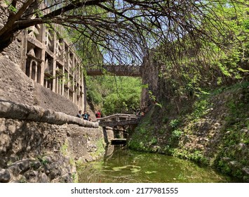 New Chandigarh, India – April 4, 2022: Pathway Along The Feature Wall At The Rock Garden Of Chandigarh, Also Known As Nek Chand Saini's Rock Garden Of Nathupur, A Sculpture Garden For Rock Enthusiasts