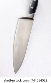 New Chef Knife Isolated Above White Marble Background Table.