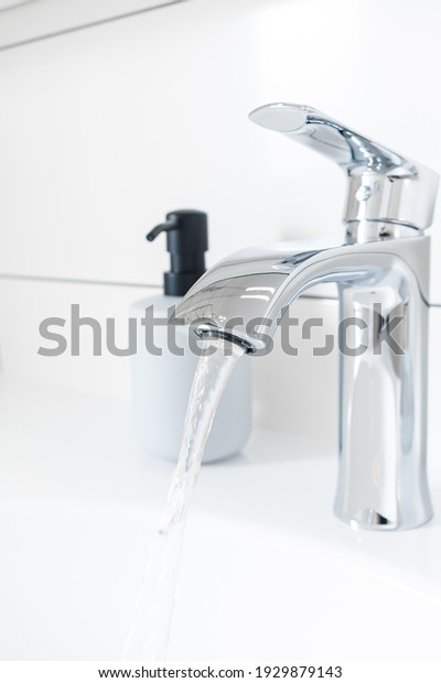 New chrome\
or steel mixer tap for bathroom\
sinks