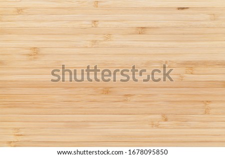 New clean bamboo board with striped pattern, flat background photo texture, frontal view