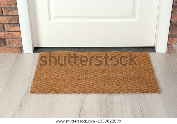 New clean\
mat near entrance door. Household\
item