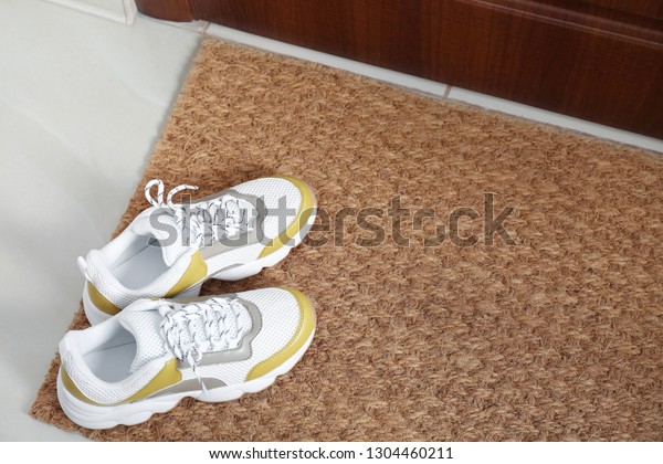 New Clean Mat Shoes Near Entrance Stock Photo Edit Now 1304460211