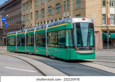 New clean tram with five cars on the Heslinki street.