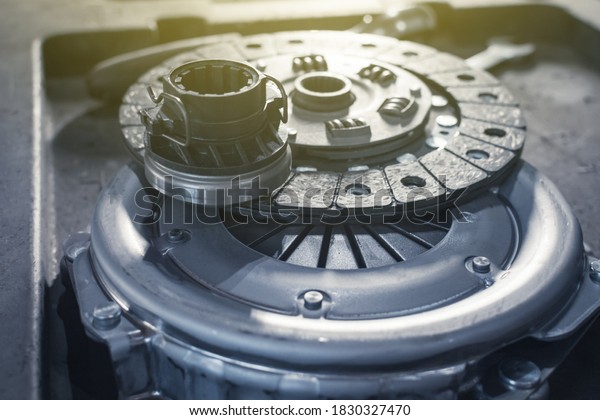 new clutch kit in a car service before installation on\
a car. Close up
