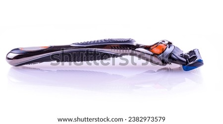 New colored Sensor shaving razor isolated on a white background