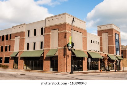 New Commercial, Retail And Office Space Available For Sale Or Lease In Generic Red Brick Office Building With Awning