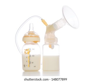 New compact electric breast pump to increase milk supply for breastfeeding mother and child feeding bottle with breastmilk isolated on white background