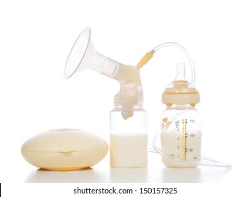 New compact electric breast pump to increase milk supply for breastfeeding mother and bags of frozen breastmilk isolated on white background