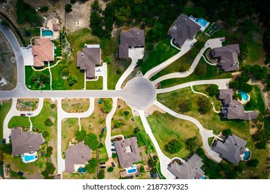 New Construction Homes And Houses Above Suburb Living In A New Build Community With A Cul De Sac Circle And Driveways Leading Into Luxury Large Mansion Homes Outside Of Austin , Texas , USA 