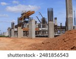 New construction site with crane and mechanical equipments on sunset daylight background. construction industry.